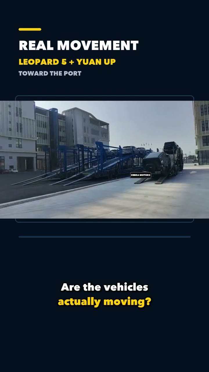 Transporter carrying Leopard 5 and Yuan UP vehicles